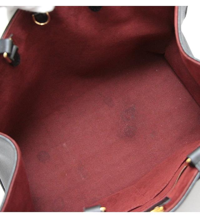 Louis Vuitton On the Go MW Monogram Emplant Shoulder Bag