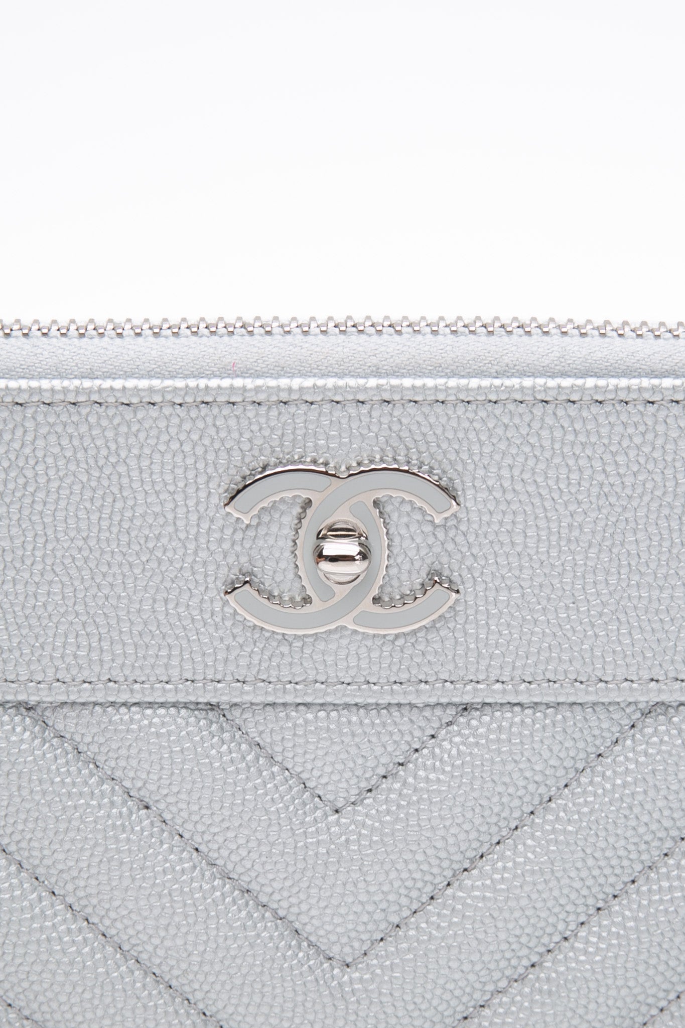 CHANEL Metallic Silver Caviar Chevron Quilted Small Mademoiselle Zip Pouch Case