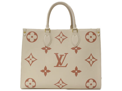Louis Vuitton On The Go MM Handbag Monogram Implant Creme