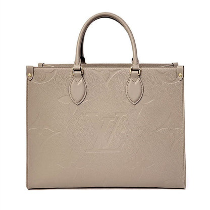 Louis Vuitton On The Go MM Monogram Empreinte Tourterelle Creme