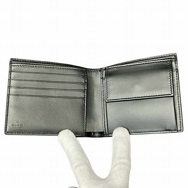 Gucci GG Signature Leather Wallet