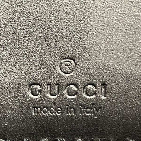 Gucci GG Signature Leather Wallet