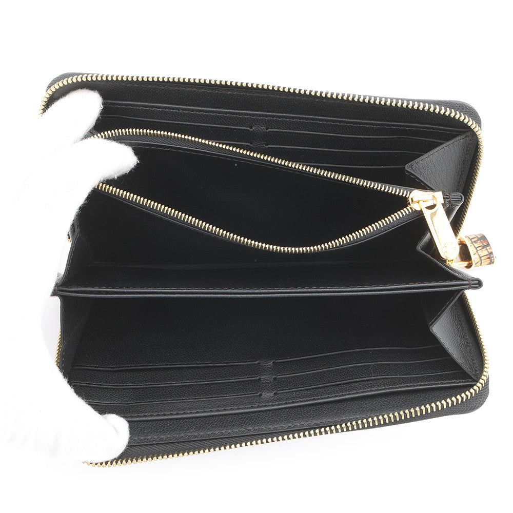 LOUIS VUITTON Zippy wallet Black/Gold Exotic Leather