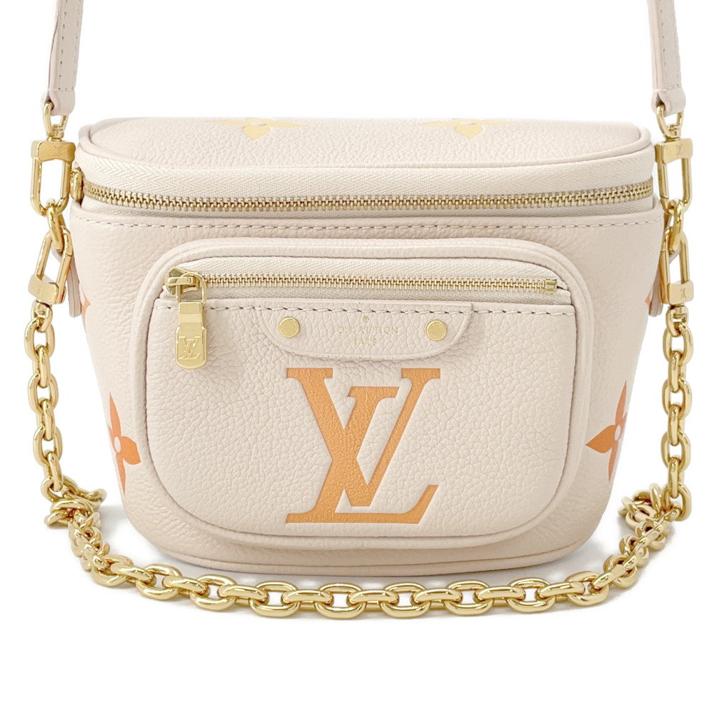 LOUIS VUITTON Mini Bumbag IvoryM82208 Monogram Empreinte Leather by the Pool
