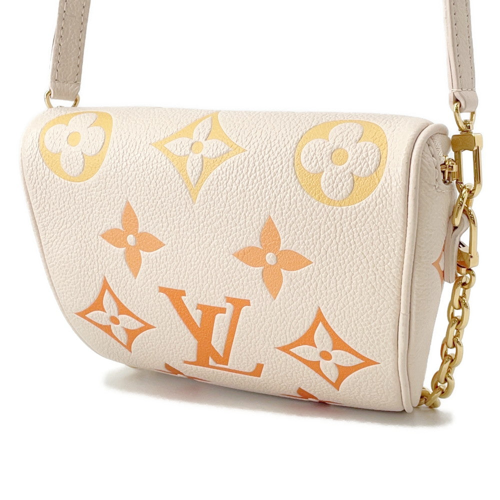LOUIS VUITTON Mini Bumbag IvoryM82208 Monogram Empreinte Leather by the Pool