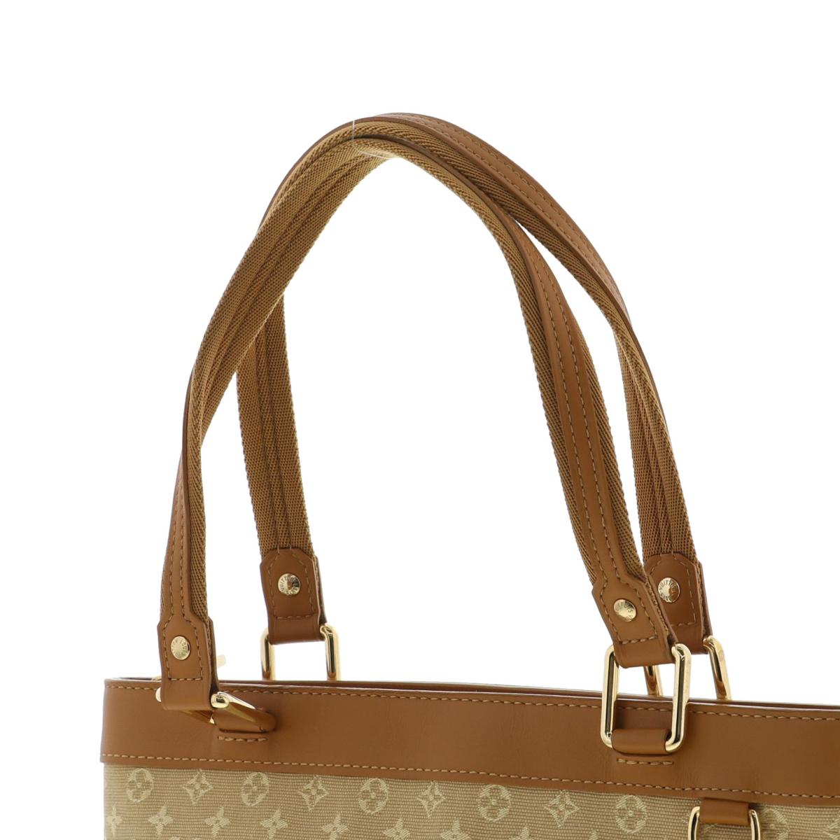 Louis Vuitton  Lucie PM Monogram Shoulder Bag