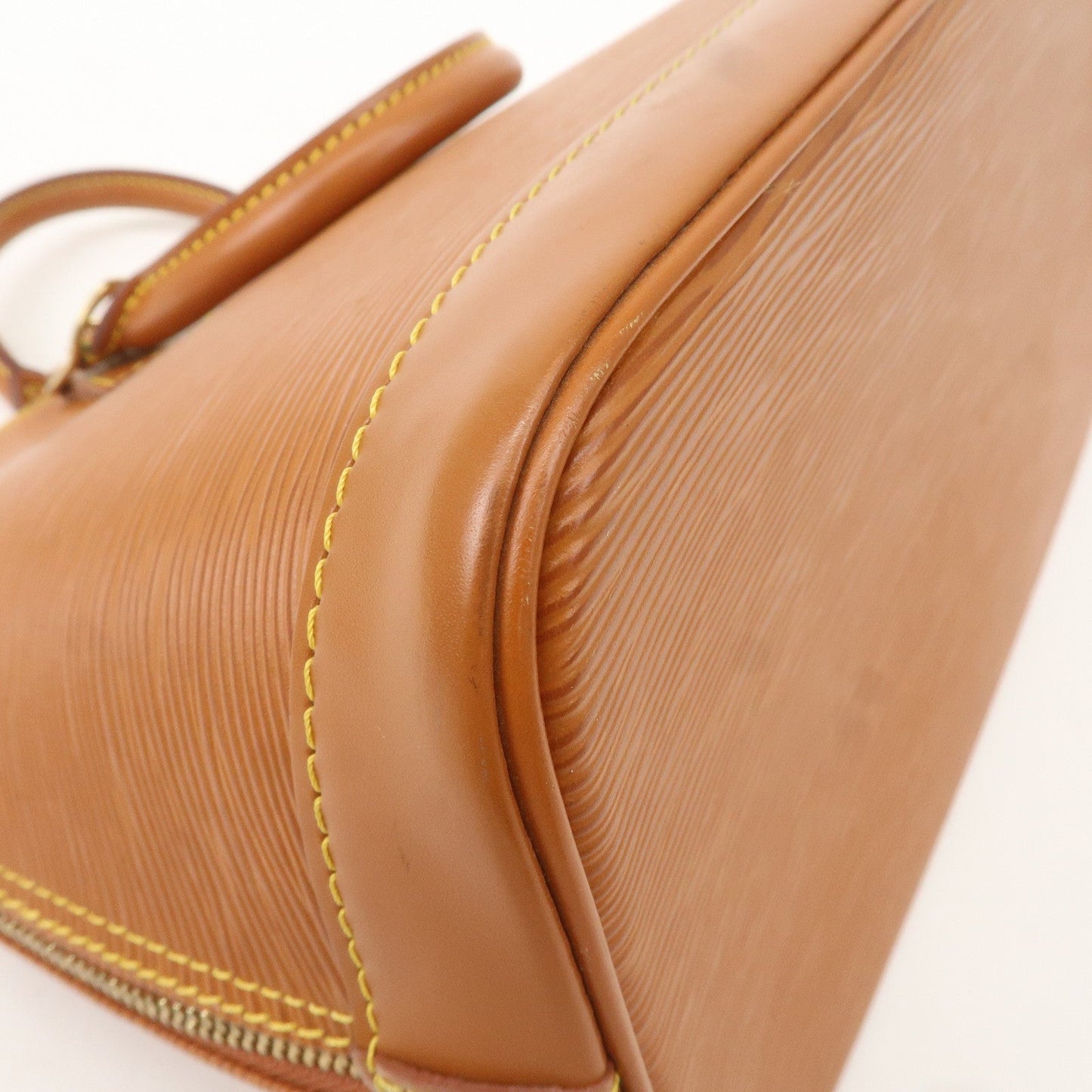 Louis Vuitton Epi Leather Alma Hand Bag Zipang Gold M52148