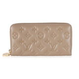 Louis Vuitton Louis Vuitton Taupe Monogram Embossed Lambskin Coussin Zippy Wallet