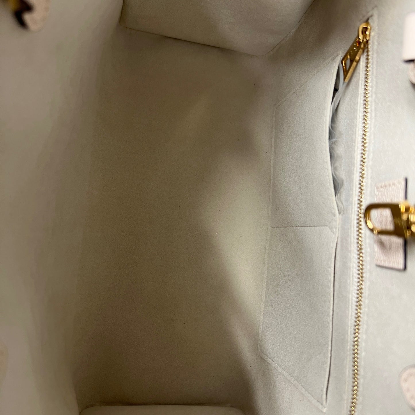 Louis Vuitton Cream Saffron Giant Monogram Empreinte Onthego MM