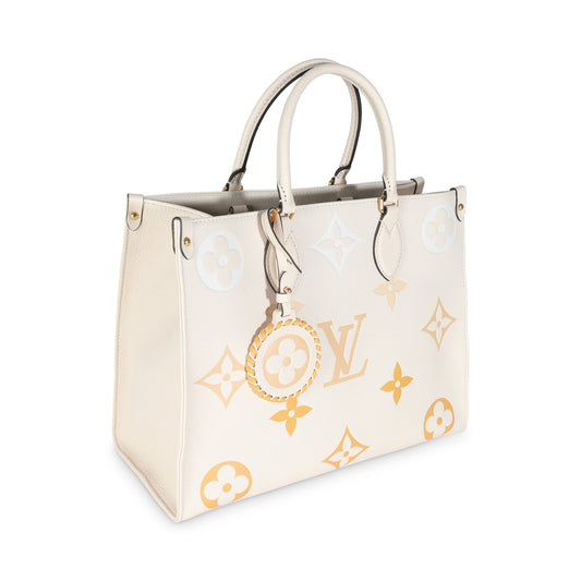 Louis Vuitton Cream Saffron Giant Monogram Empreinte Onthego MM