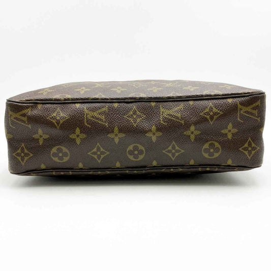 Louis Vuitton Trousse De Toilette  Canvas Clutch Bag