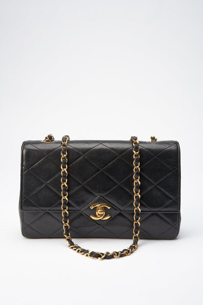 Chanel   Black Single Flap with 24k gold plated hardware and V design