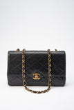 Chanel   Black Single Flap with 24k gold plated hardware and V design
