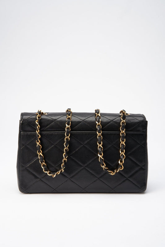 Chanel   Black Single Flap with 24k gold plated hardware and V design