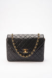 Chanel   Black Single Flap with 24k gold plated hardware