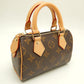 Louis Vuitton Monogram Nano Speedy Handbag Brown