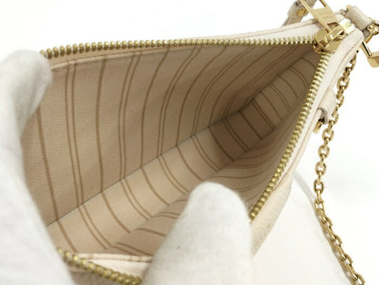 Louis Vuitton Easy Pouch Monogram Emplant Shoulder Bag