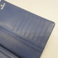 Chanel bi-fold long wallet matelasse lambskin navy silver metal