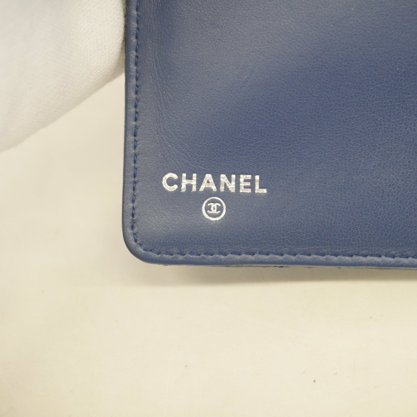Chanel bi-fold long wallet matelasse lambskin navy silver metal
