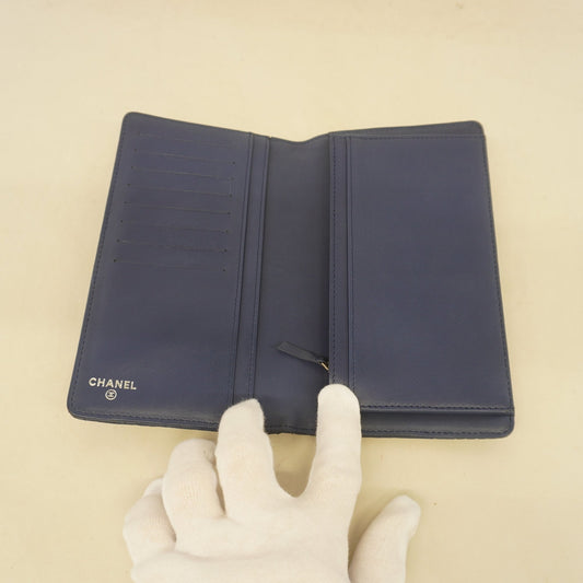 Chanel bi-fold long wallet matelasse lambskin navy silver metal