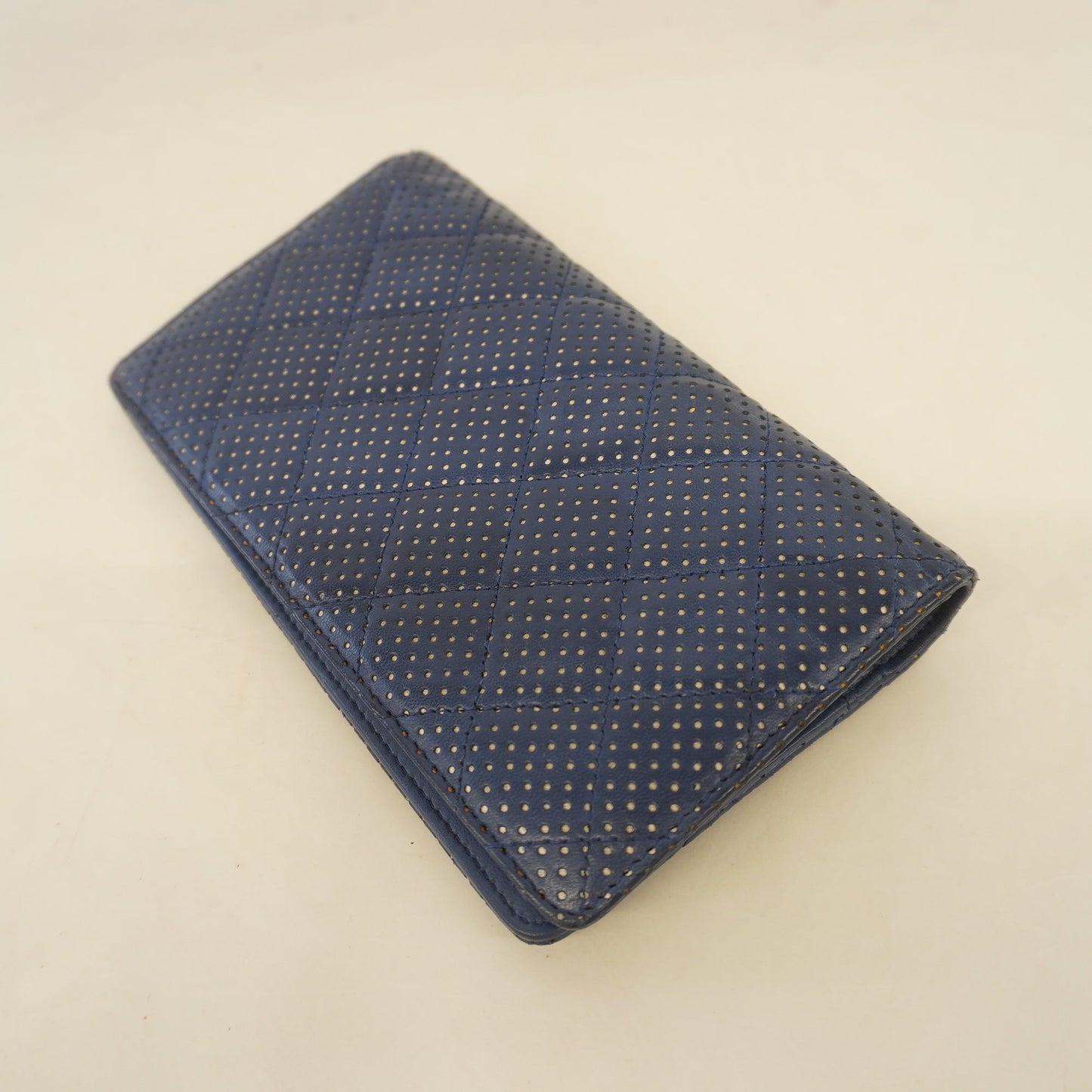 Chanel bi-fold long wallet matelasse lambskin navy silver metal