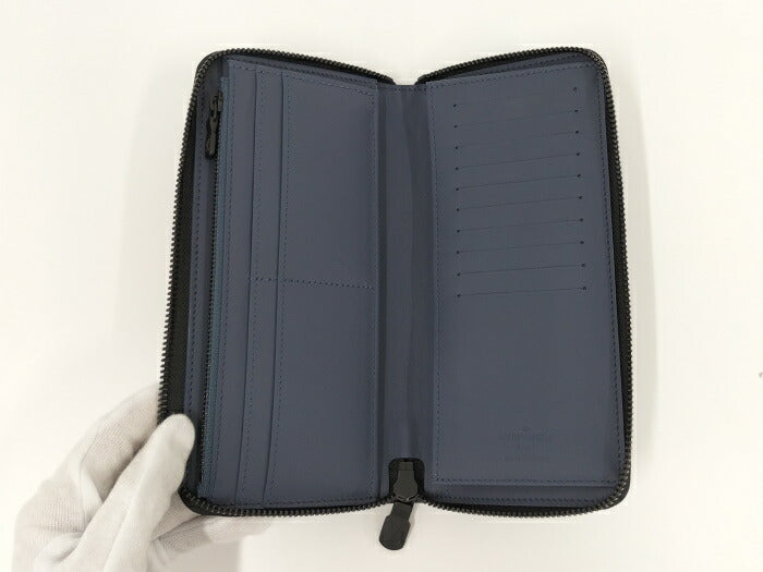 Louis Vuitton Monogram Emplant Vertical Zippy Wallet