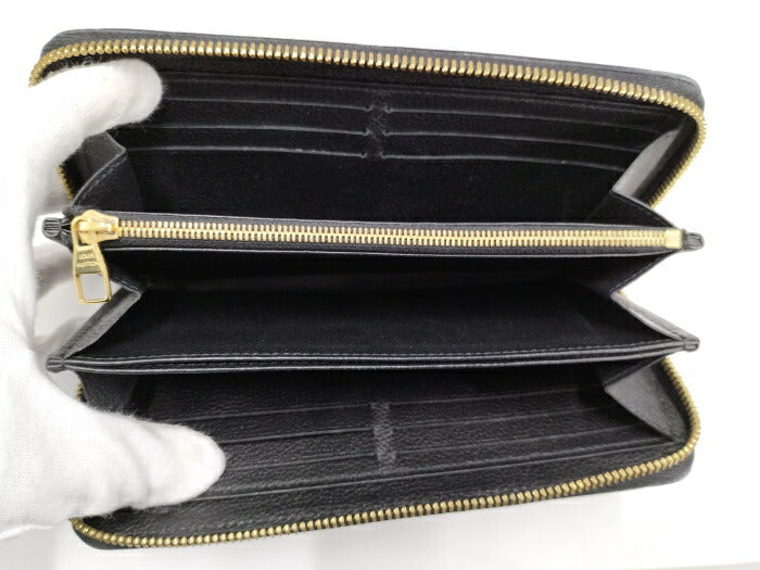 Louis Vuitton Monogram Emplant Round Zipper Long Wallet