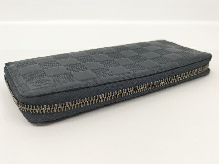 Louis Vuitton Vertical Round Zipper Long Wallet