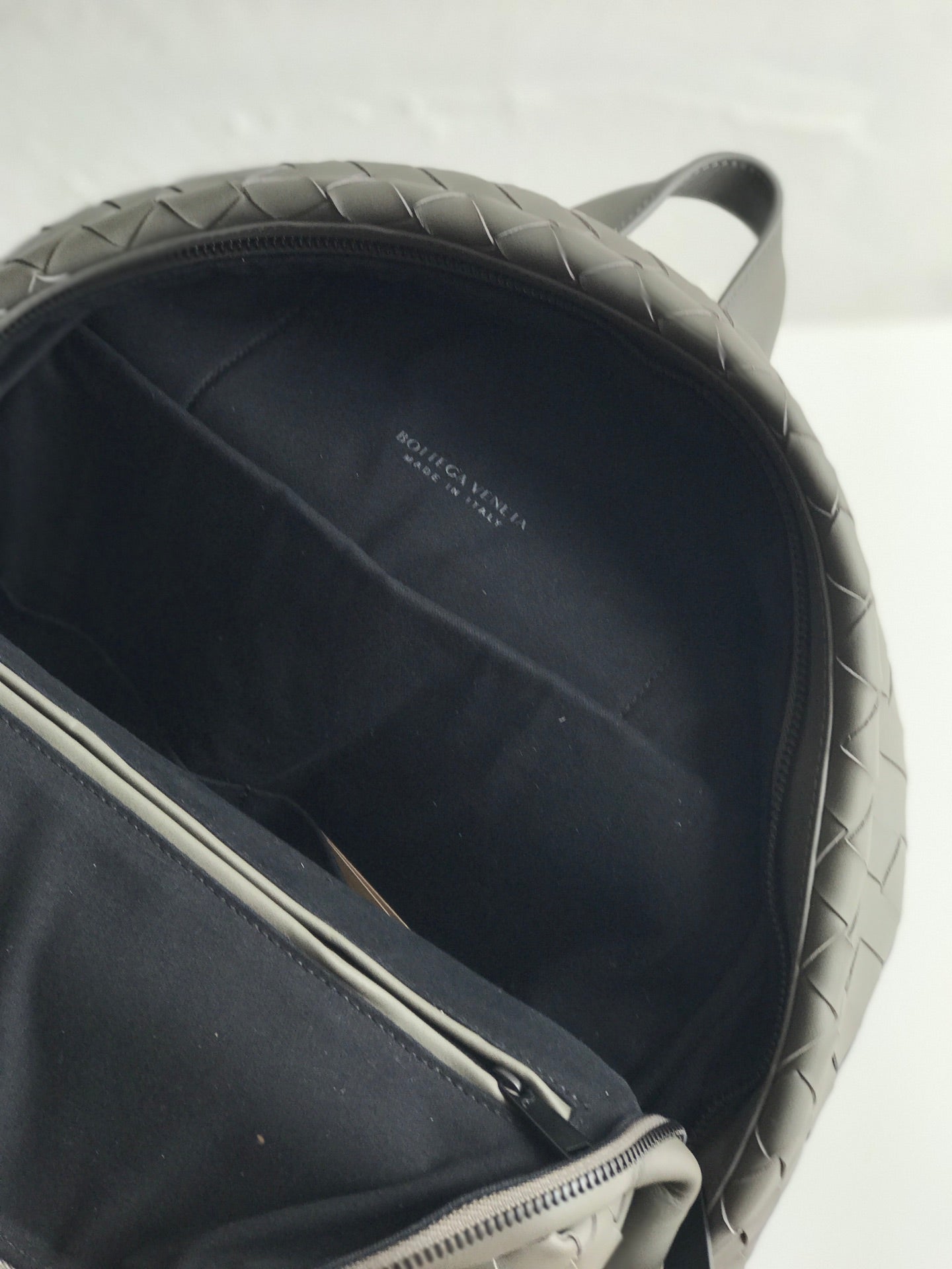 SMALL INTRECCIATO 41 BACKPACK IN CHARCOAL BLACK CALFSKIN Amelia Amelia