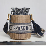 BUCKET BAG 19 IN BLACK OBLIQUE JACQUARD AND BEIGE WICKER Amelia
