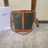 BUCKET 33 IN BLACK TRIOMPHE CANVAS AND BRONZE BROWN CALFSKIN TRIM Amelia Amelia