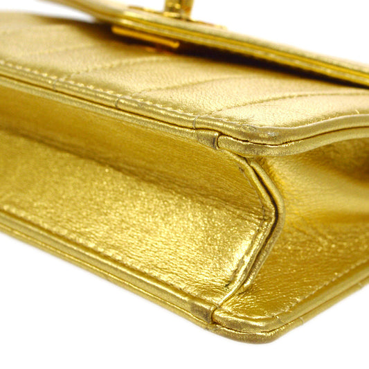 CHANEL 1991-1994 Chevron Letter Flap Vertical Bag Mini Gold Lambskin