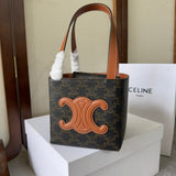 CUBE BAG 15 IN BLACK TRIOMPHE CANVAS AND BROWN CALFSKIN Amelia Amelia