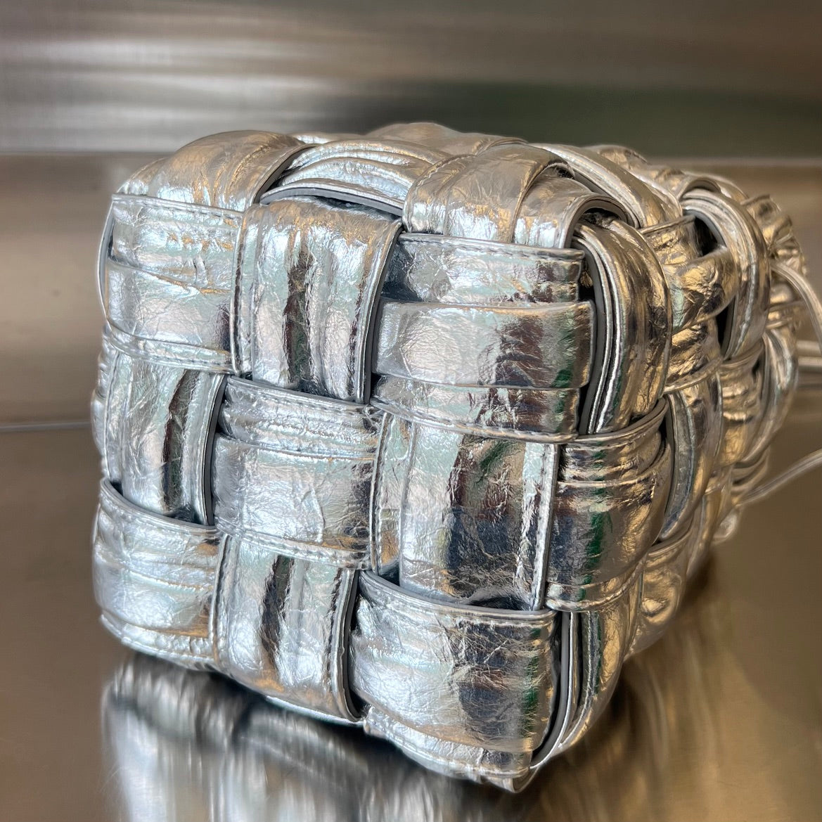SMALL CASSETTE BUCKET 18 IN SILVER METALLIC SOFT LAMBSKIN Amelia Amelia