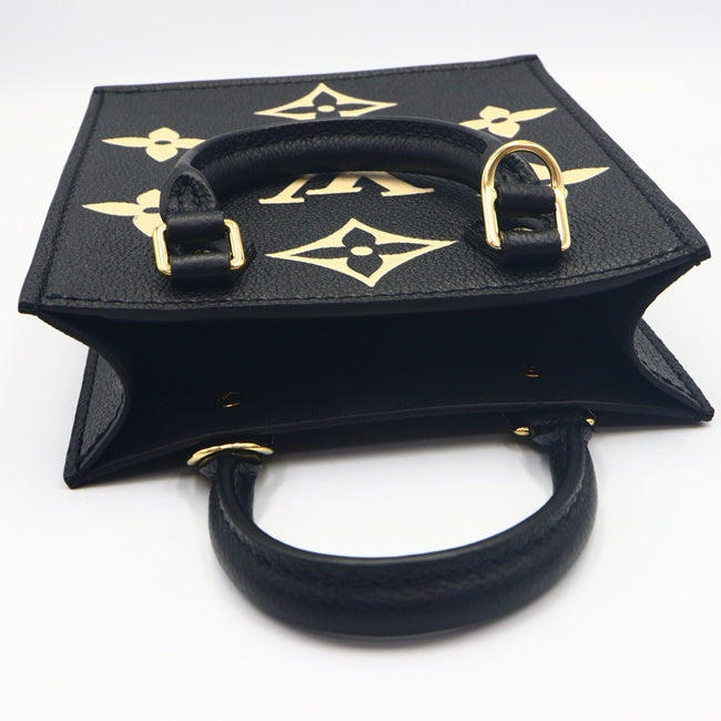 Louis Vuitton Petite Sac Monogram Implant Handbag