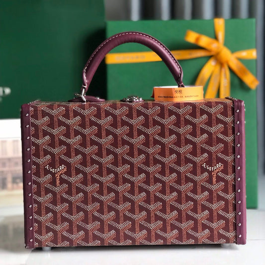 GRAND HÔTEL TRUNK BAG 24 IN BURGUNDY RED GOYARDINE CANVAS AND CALFSKIN Amelia Amelia
