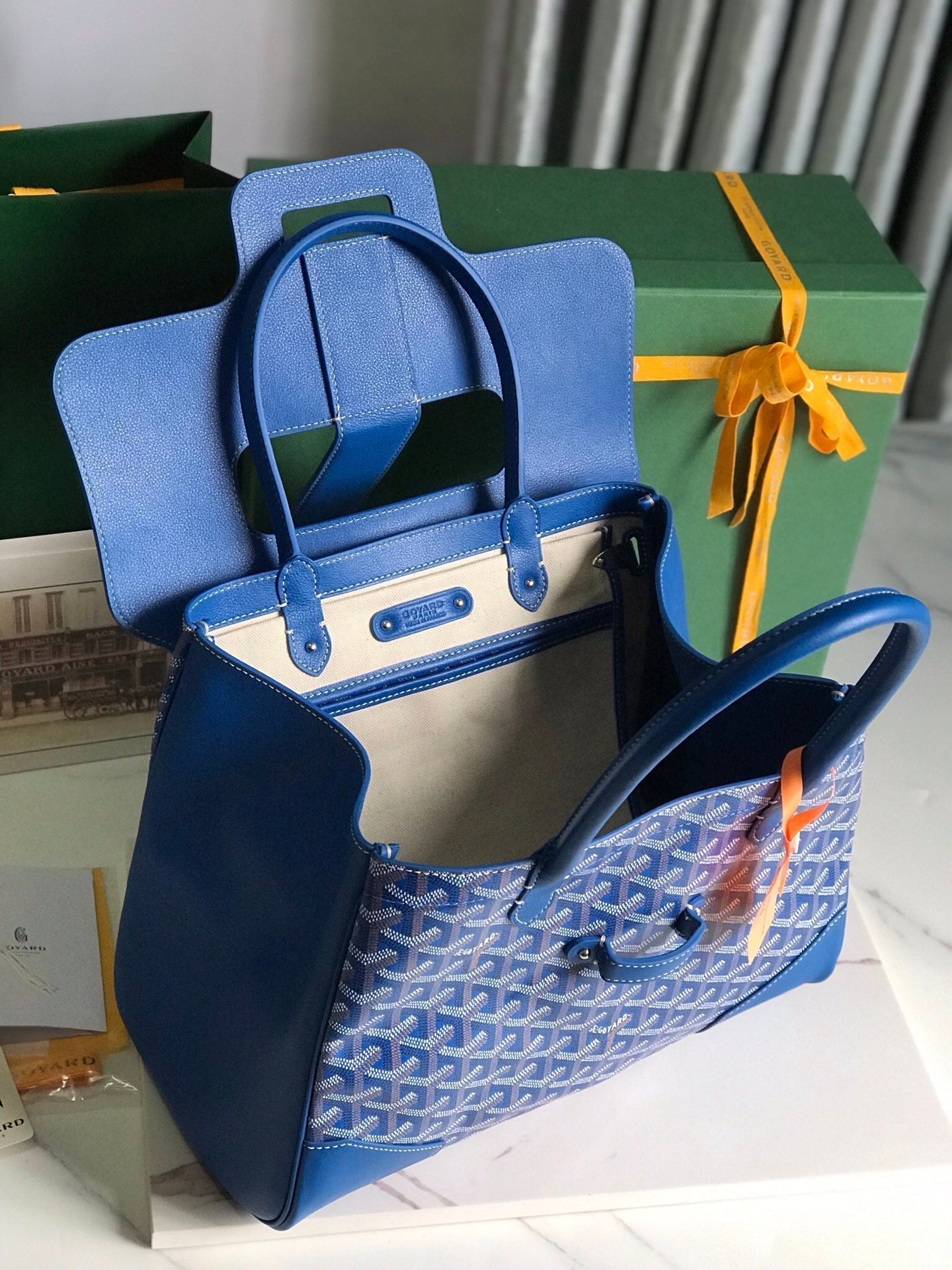 SAIGON SOUPLE BAG 34 IN CURIOUS BLUE GOYARDINE CANVAS AND CALFSKIN Amelia Amelia