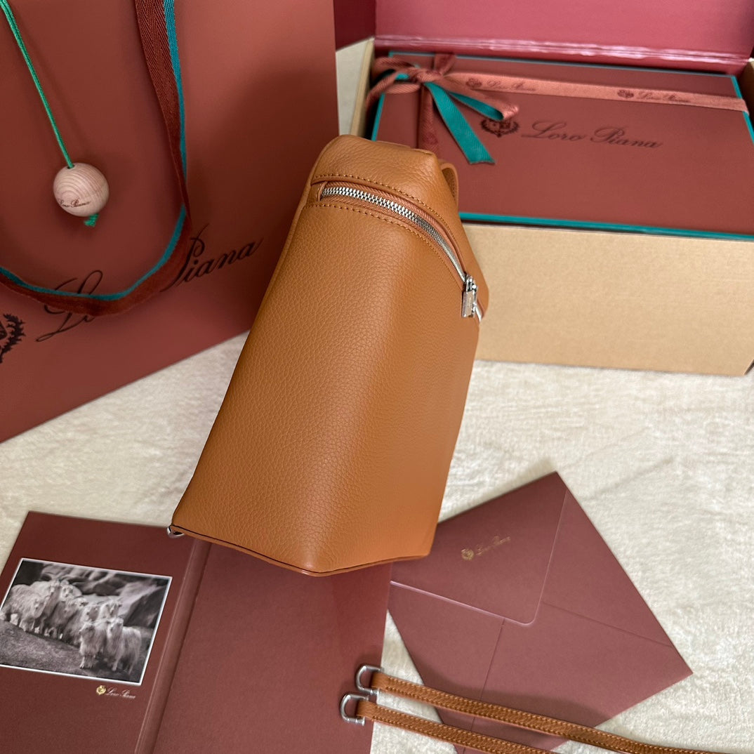EXTRA POCKET BACKPACK L23.5 IN GINGER ORANGE CALFSKIN WITH SILVER HARDWARE Amelia Bags