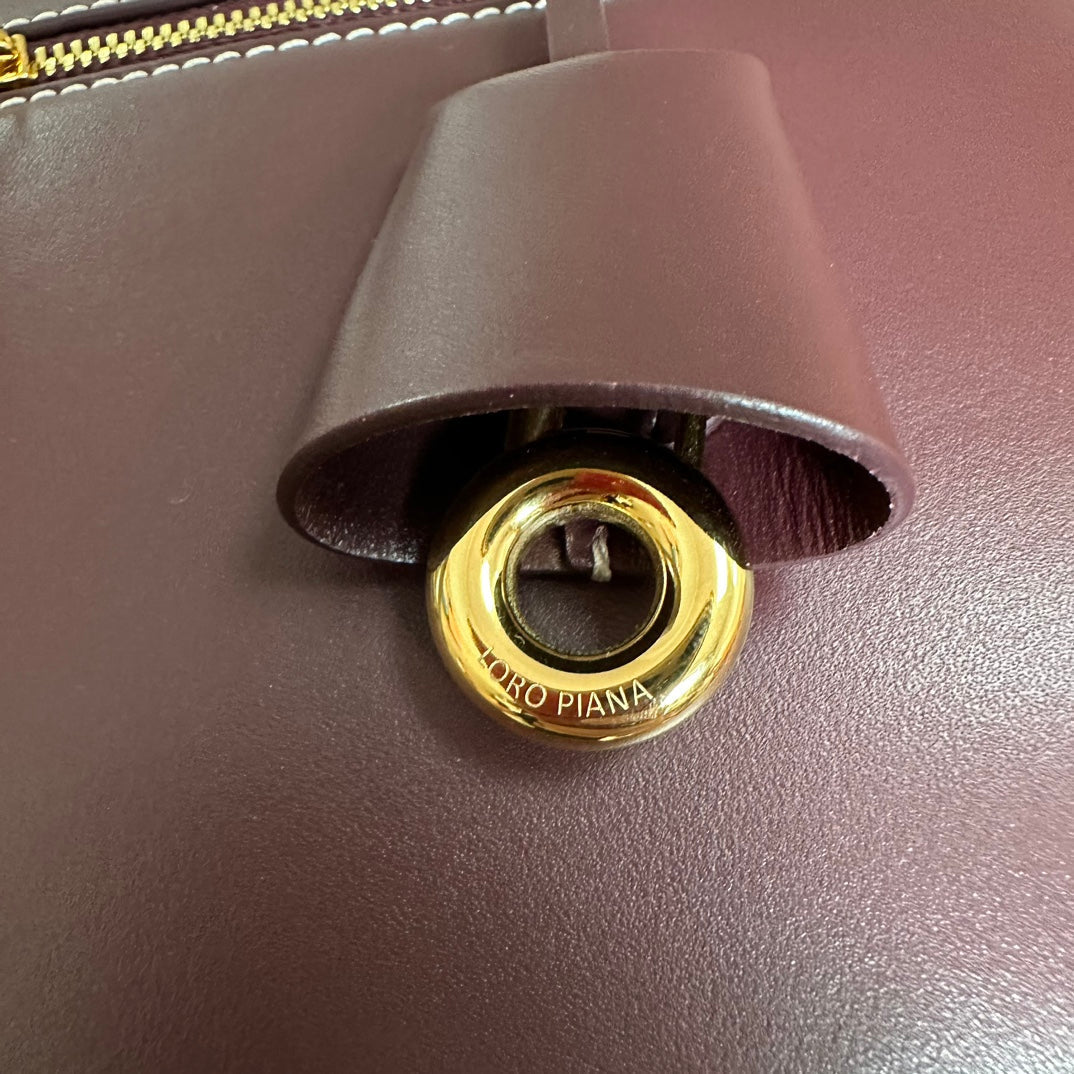 EXTRA BAG L27 IN WINE PURPLE SMOOTH CALFSKIN WITH GOLD HARDWARE by Amelia