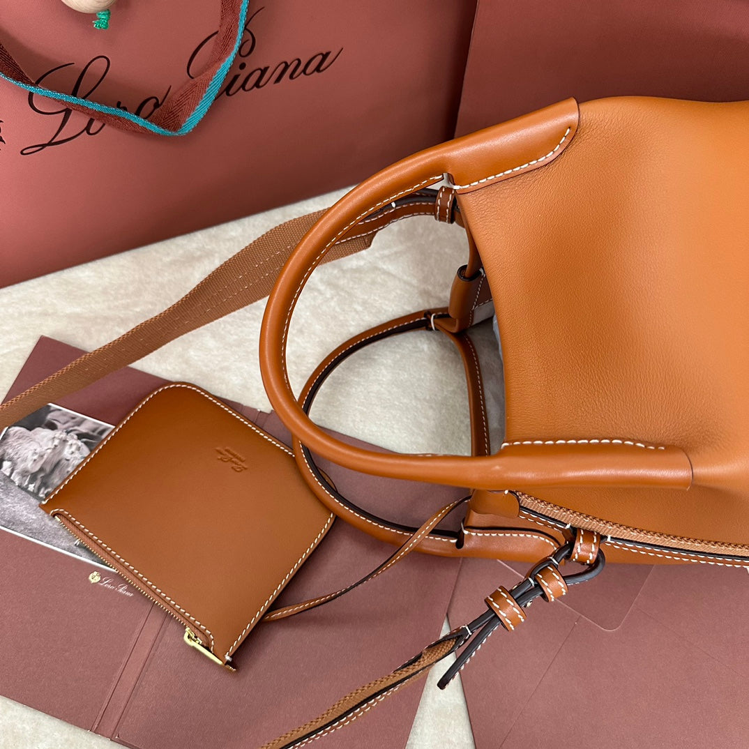 SMALL 21 BALE BAG IN BRONZE BROWN GRAINED CALFSKIN WITH GOLD HARDWARE by Amelia