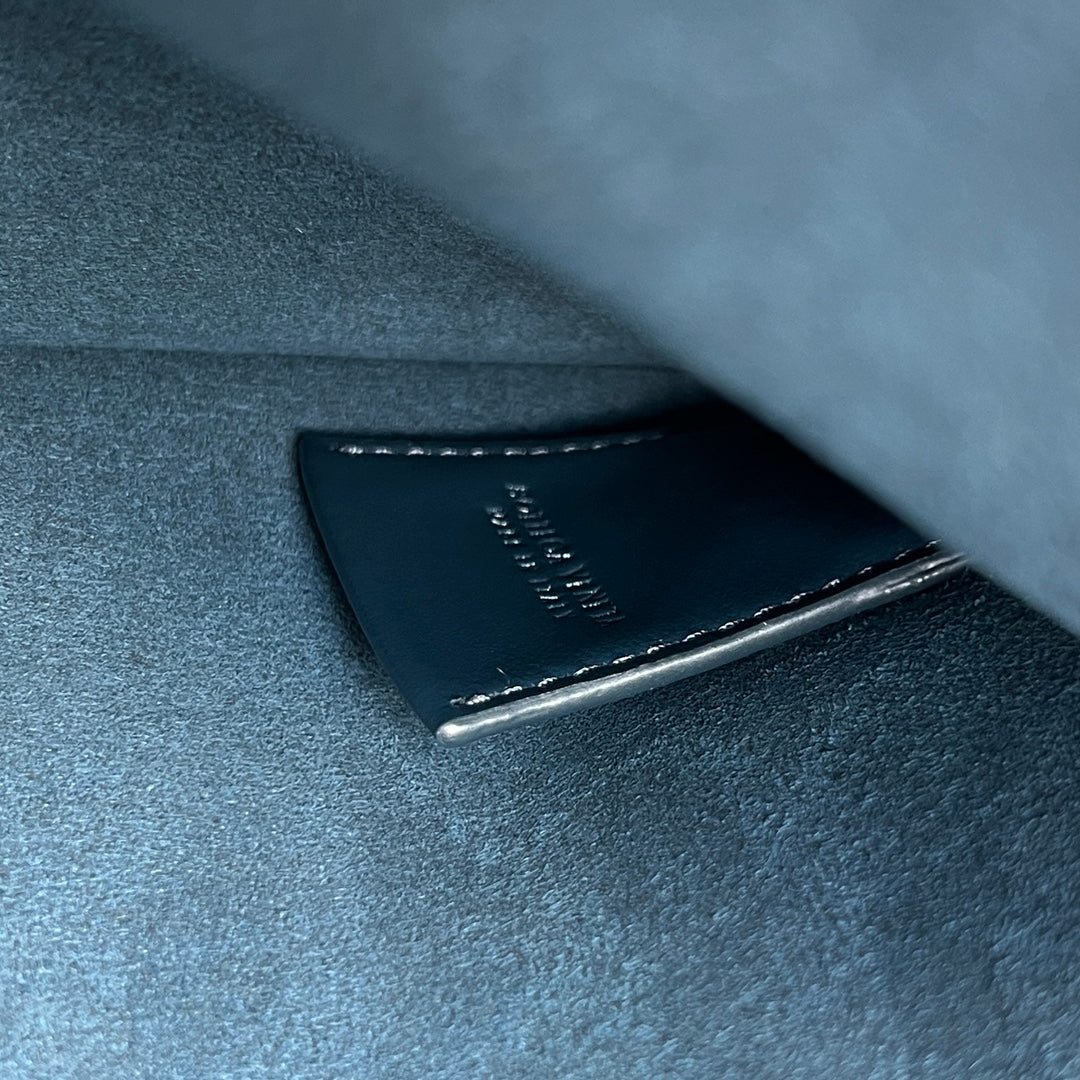 INTRECCIATO CLUTCH 32 IN PICKLED BLUEWOOD SOFT CALFSKIN Amelia Amelia