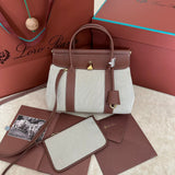 LOOM BAG 25 IN UMBER BROWN CALFSKIN WITH BEIGE LINEN GOLD HARDWARE Amelia