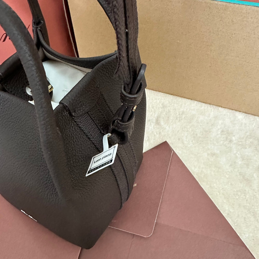 MICRO BALE BAG IN CHOCOLATE BROWN CALFSKIN by Amelia
