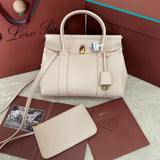 LOOM BAG 25 IN LIGHT PINK SMOOTH CALFSKIN WITH GOLD HARDWARE Amelia Amelia
