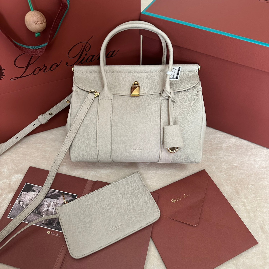 LOOM BAG 25 IN PALE GRAY SMOOTH CALFSKIN WITH GOLD HARDWARE by Amelia