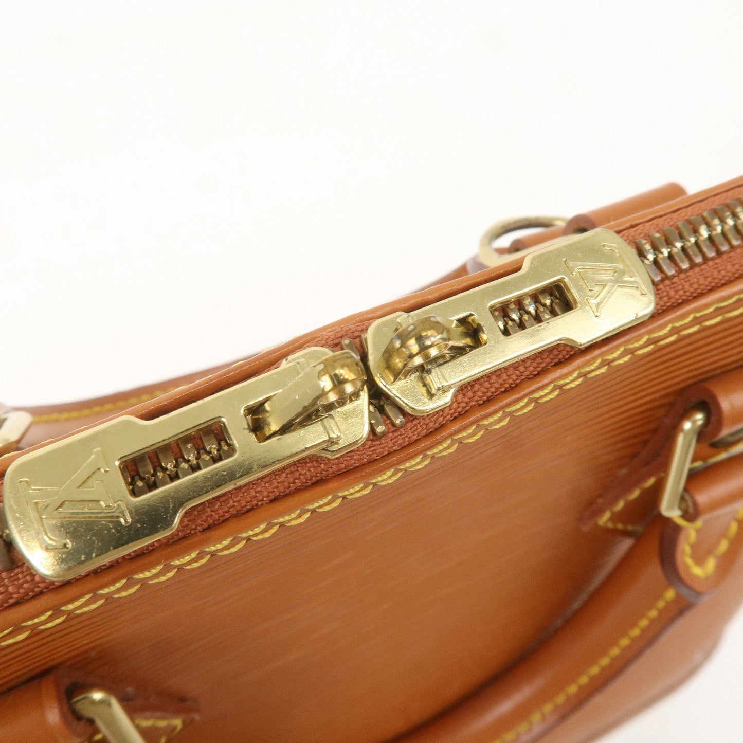 Louis Vuitton Epi Leather Alma Hand Bag Zipang Gold M52148