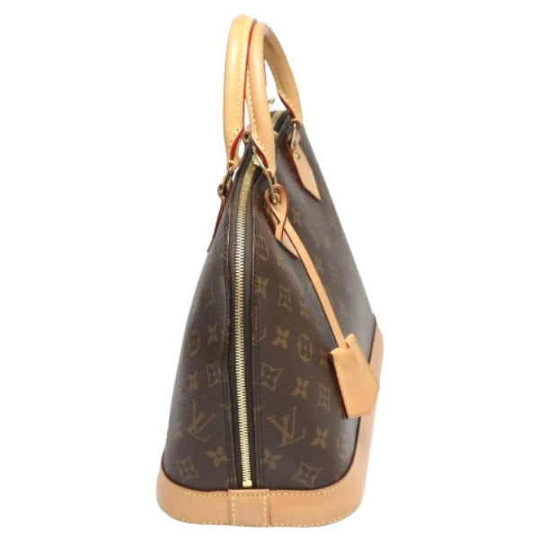 Louis Vuitton Alma Crochet Monogram Handbag