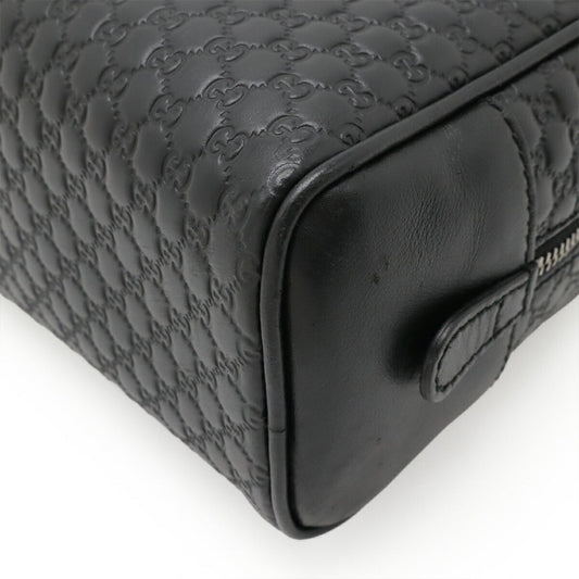 Gucci Microguccissima Leather Clutch Bag