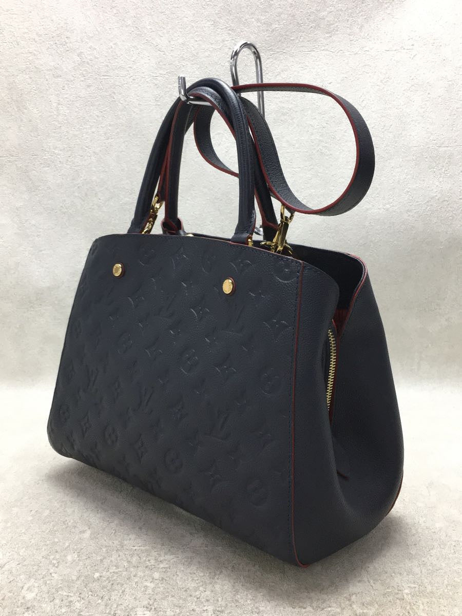 Louis Vuitton Montaigne MM Monogram Emplant Navy Cowhide Handbag