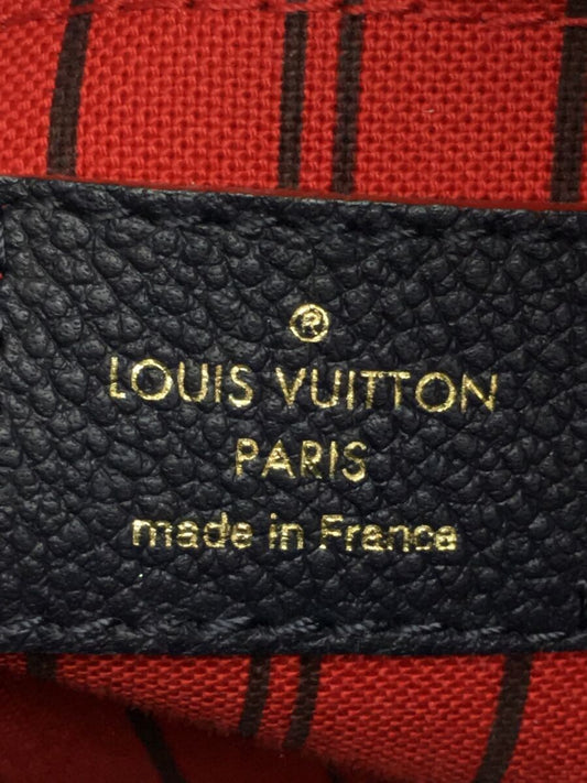 Louis Vuitton Montaigne MM Monogram Emplant Navy Cowhide Handbag